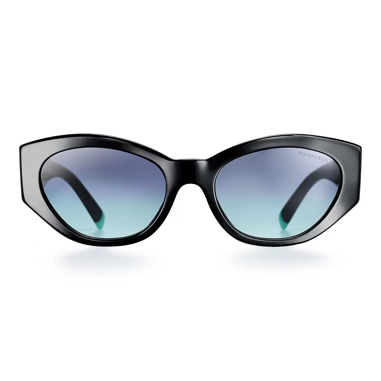 Tiffany & Co. Sunglasses^Tiffany Blue® oval sunglasses in black acetate. |